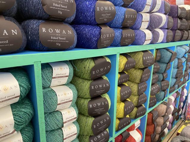 a shelf of Felted Tweed yarn